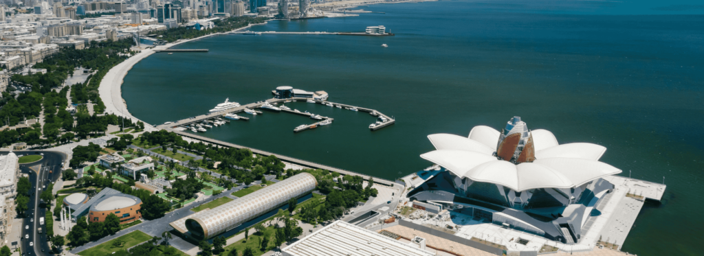 a body of water with boats and buildings