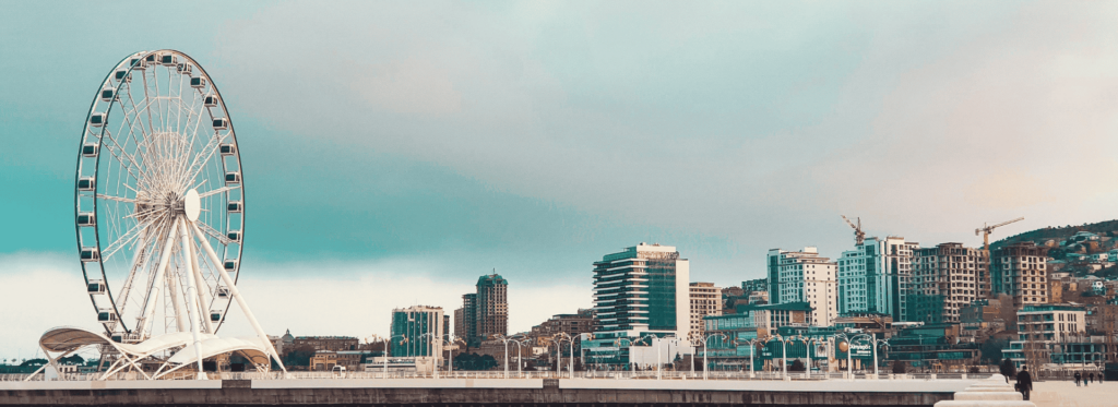 a city skyline with a bridge and buildings