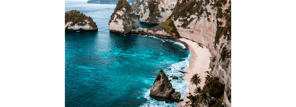 Scenic view of Nusa Lembongan's beach and cliffs, showcasing the island's natural beauty and coastal landscape.
